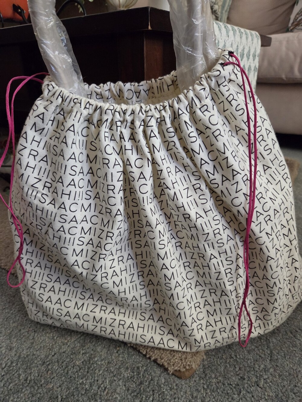 Isaac Mizrahi Cream Logo Tote with Yellow Trim.